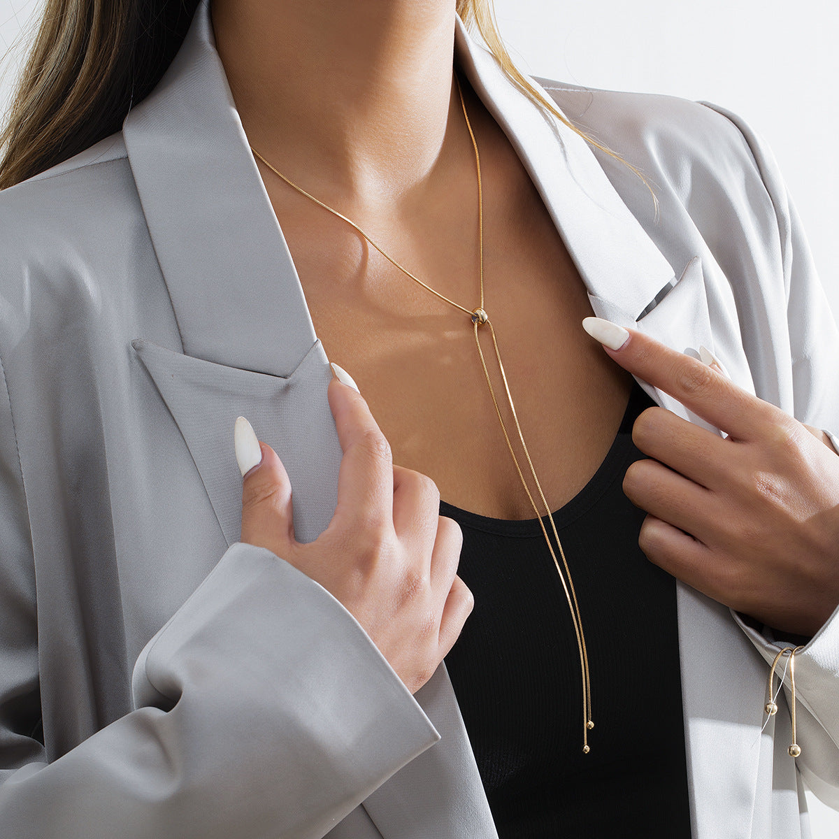 Simple and versatile long tassel necklace with fashionable adjustable metal square snake bone chain