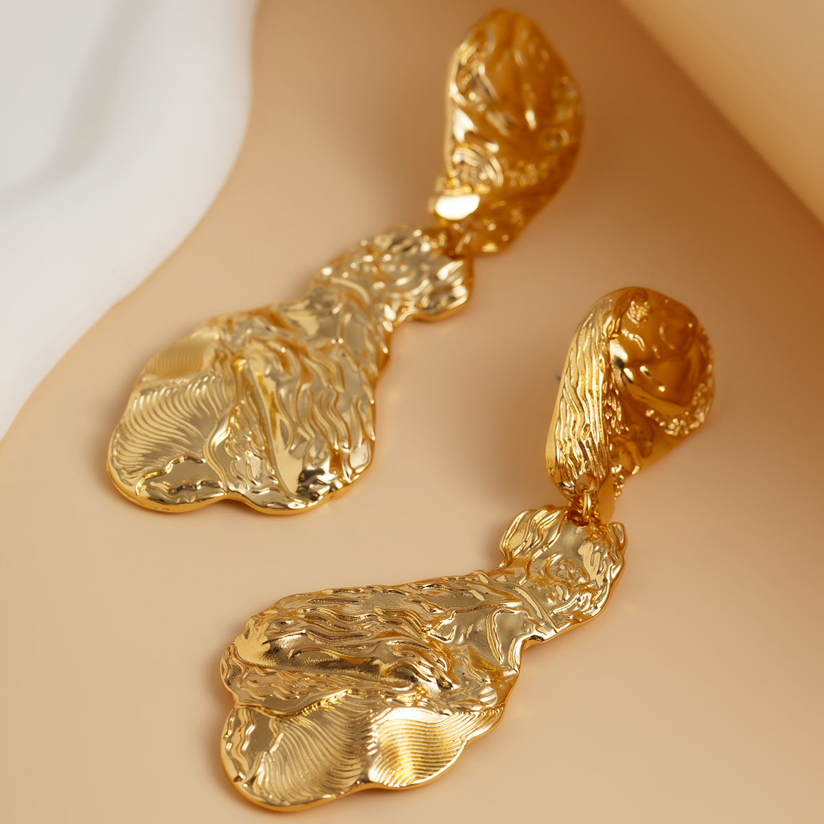 Ins personalized pleated hollow peach heart earrings with diverse combinations of sunflower alloy earrings