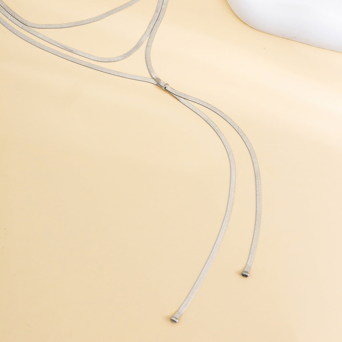 Multi layer necklace snake bone chain neck chain with a cool and stylish design, featuring a textured chain and tassel necklace