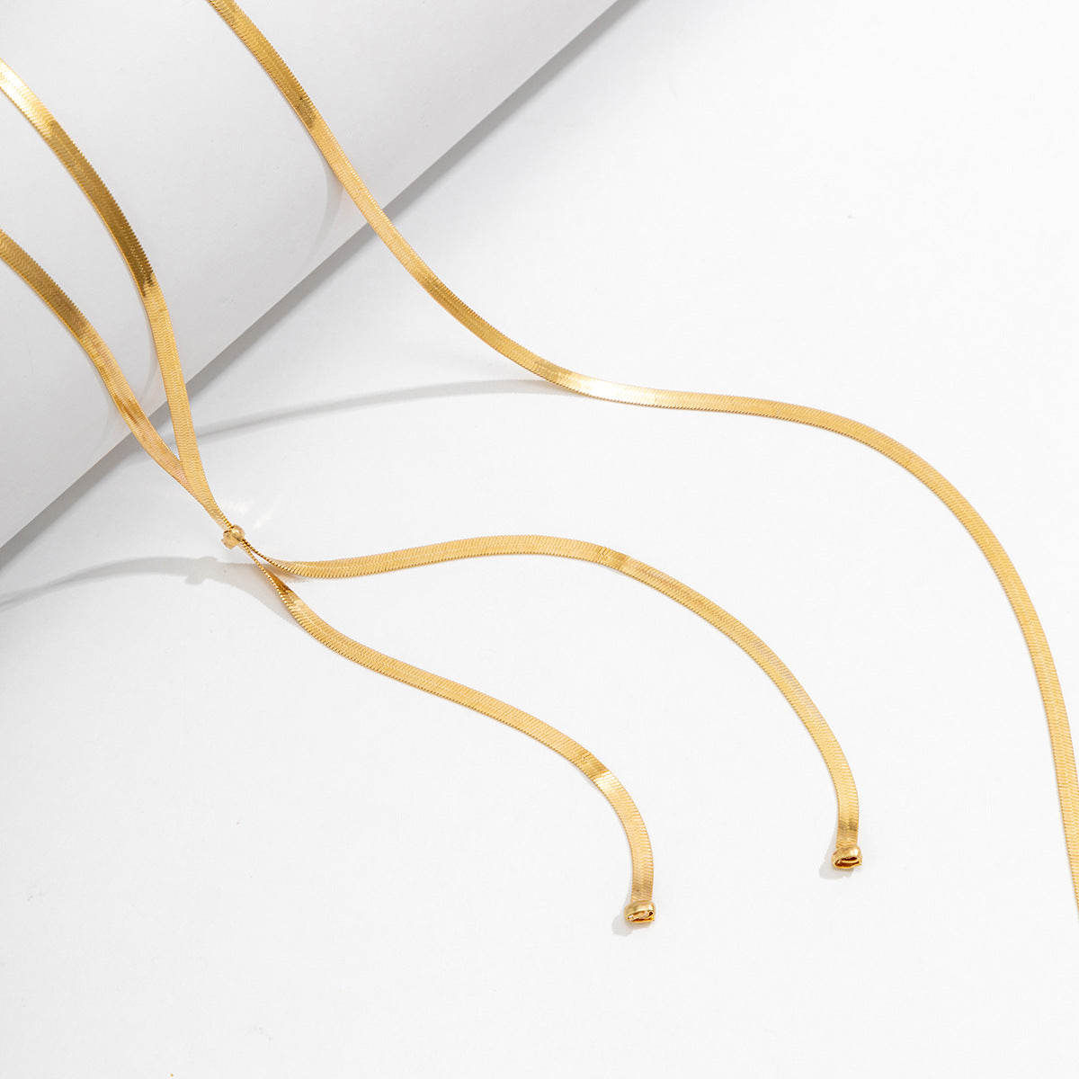Multi layer necklace snake bone chain neck chain with a cool and stylish design, featuring a textured chain and tassel necklace